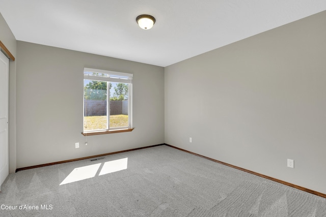 13388 N Polaris St, Rathdrum, ID 83858 - unfurnished room with carpet flooring and baseboards