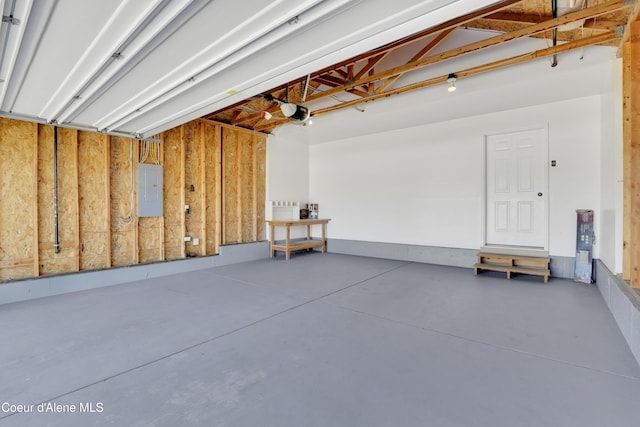 13388 N Polaris St, Rathdrum, ID 83858 - garage with electric panel and a garage door opener