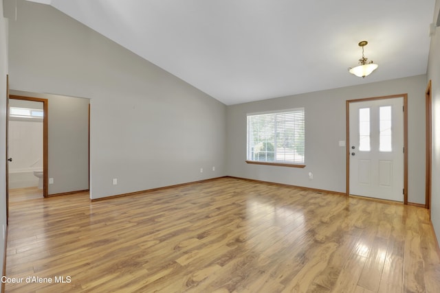 13388 N Polaris St, Rathdrum, ID 83858 - foyer entrance with light wood-type flooring and high vaulted ceiling