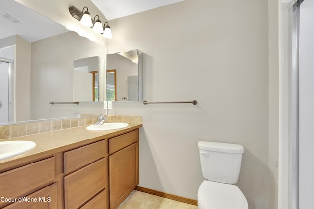 13388 N Polaris St, Rathdrum, ID 83858 - bathroom with double vanity and toilet