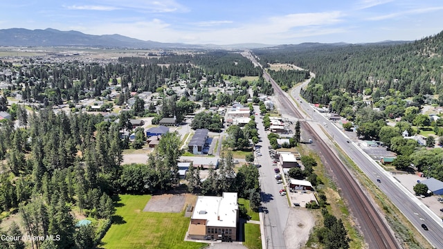 13388 N Polaris St, Rathdrum, ID 83858 - aerial view of a mountain backdrop and a heavily wooded area