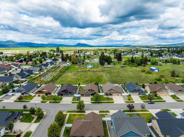 10939 N Seaside St, Hayden, ID 83835 - aerial perspective of suburban area featuring a mountainous background
