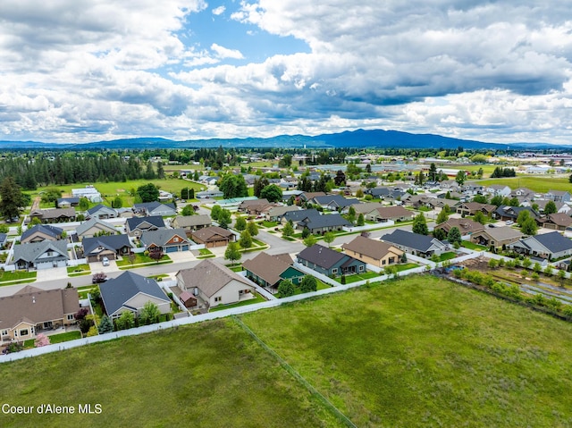 10939 N Seaside St, Hayden, ID 83835 - aerial perspective of suburban area featuring a mountainous background