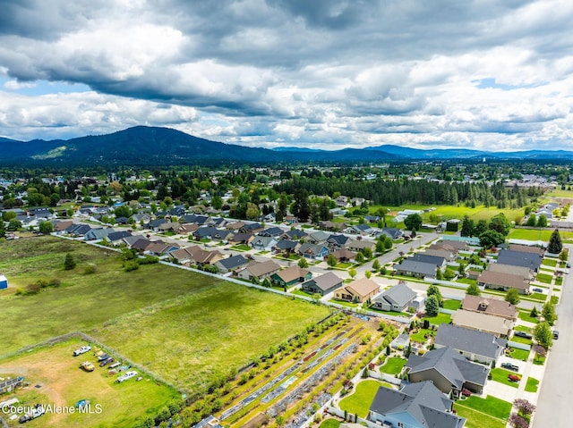 10939 N Seaside St, Hayden, ID 83835 - aerial view of residential area featuring a mountain backdrop