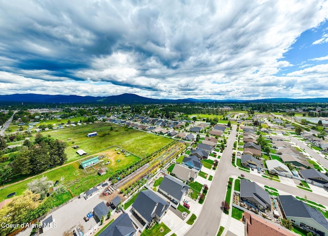 10939 N Seaside St, Hayden, ID 83835 - aerial perspective of suburban area featuring mountains