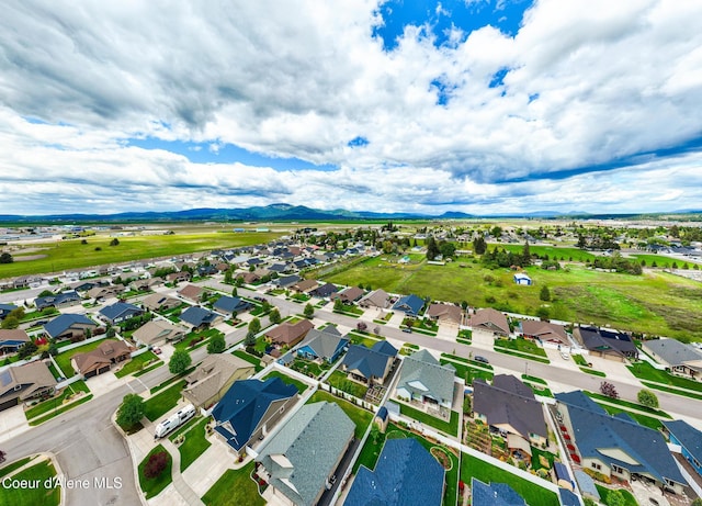 10939 N Seaside St, Hayden, ID 83835 - aerial view of residential area featuring mountains
