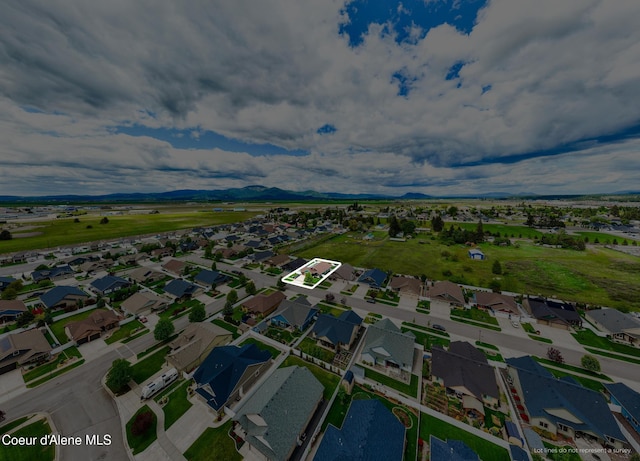 10939 N Seaside St, Hayden, ID 83835 - aerial perspective of suburban area featuring a mountain backdrop