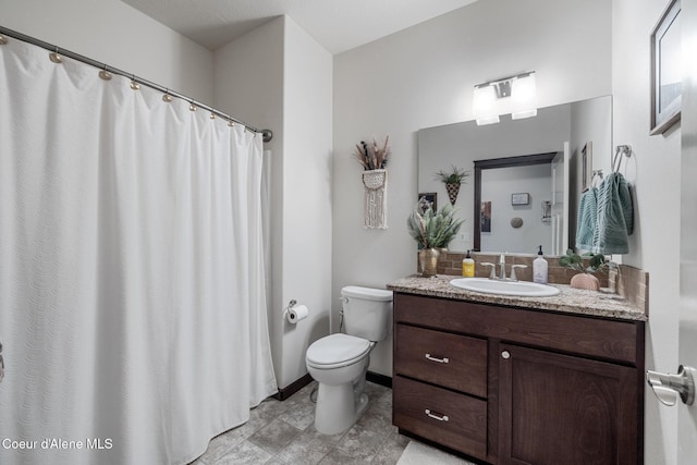 10939 N Seaside St, Hayden, ID 83835 - full bathroom with vanity, backsplash, and a shower with shower curtain