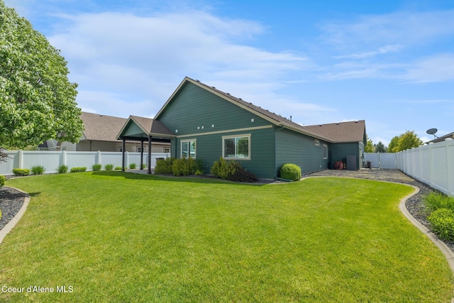 10939 N Seaside St, Hayden, ID 83835 - rear view of property with a fenced backyard