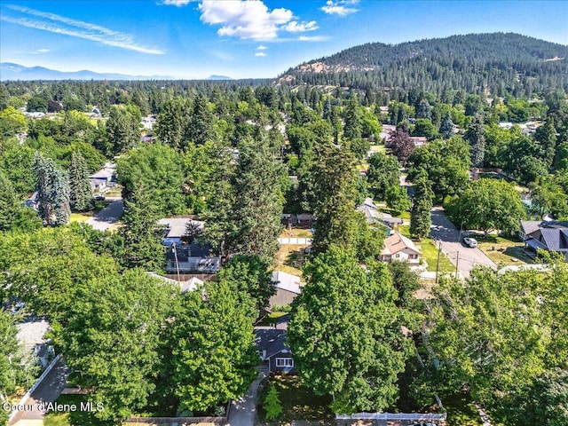 1613 E Coeur D Alene Ave, Coeur Dalene, ID 83814 - view of property location with a forest and a mountain backdrop