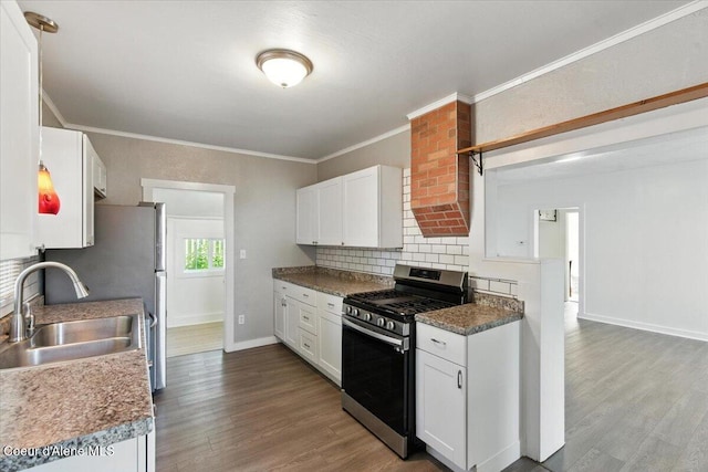 1613 E Coeur D Alene Ave, Coeur Dalene, ID 83814 - kitchen with gas stove, wood finished floors, tasteful backsplash, white cabinetry, and ornamental molding