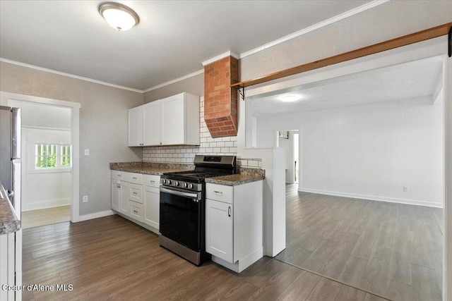 1613 E Coeur D Alene Ave, Coeur Dalene, ID 83814 - kitchen with stainless steel range with gas stovetop, wood finished floors, decorative backsplash, white cabinetry, and ornamental molding