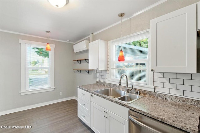 1613 E Coeur D Alene Ave, Coeur Dalene, ID 83814 - kitchen with dishwasher, crown molding, backsplash, open shelves, and pendant lighting
