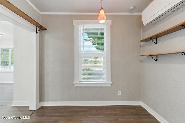 1613 E Coeur D Alene Ave, Coeur Dalene, ID 83814 - walk in closet with a wall unit AC and dark wood-type flooring