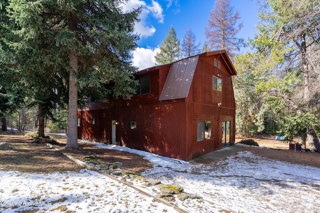 5341 Hoo Doo Loop, Oldtown, ID 83822 - view of snow covered exterior featuring a gambrel roof and a metal roof