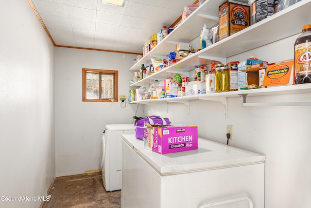 5341 Hoo Doo Loop, Oldtown, ID 83822 - washroom featuring independent washer and dryer and crown molding