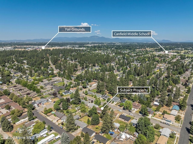 1814 E Jenny Lynn Ln, Coeur Dalene, ID 83815 - aerial view of property and surrounding area featuring a mountainous background