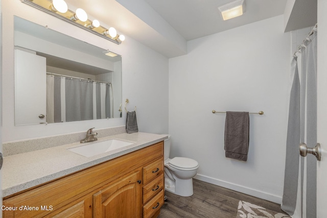 1814 E Jenny Lynn Ln, Coeur Dalene, ID 83815 - full bathroom with vanity and wood finished floors