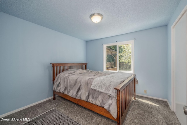 1814 E Jenny Lynn Ln, Coeur Dalene, ID 83815 - bedroom with carpet flooring and a textured ceiling