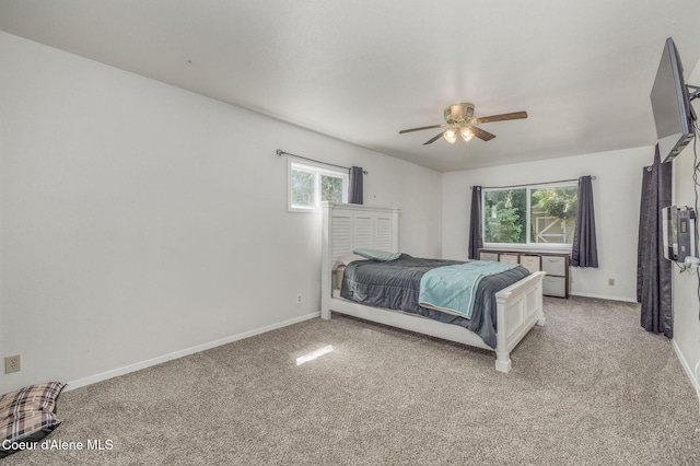 1814 E Jenny Lynn Ln, Coeur Dalene, ID 83815 - bedroom with light colored carpet and a ceiling fan