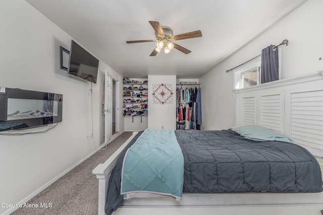 1814 E Jenny Lynn Ln, Coeur Dalene, ID 83815 - bedroom with carpet flooring, a closet, a ceiling fan, and a walk in closet