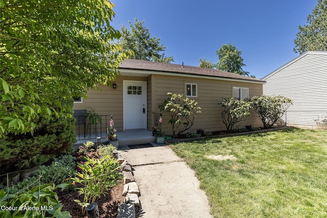 1814 E Jenny Lynn Ln, Coeur Dalene, ID 83815 - view of front facade featuring a front yard