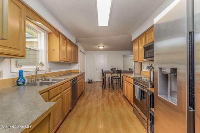 1814 E Jenny Lynn Ln, Coeur Dalene, ID 83815 - kitchen featuring stainless steel appliances and light wood-style floors