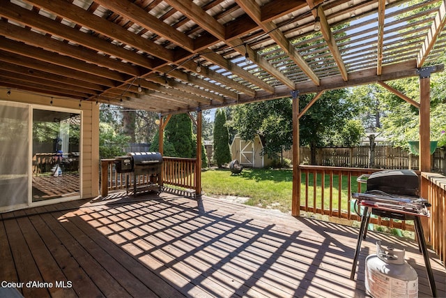 1814 E Jenny Lynn Ln, Coeur Dalene, ID 83815 - deck with a fenced backyard, a storage unit, area for grilling, and a pergola