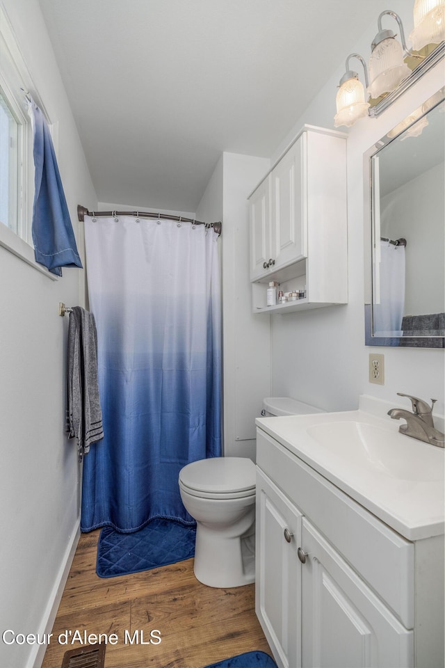 1814 E Jenny Lynn Ln, Coeur Dalene, ID 83815 - bathroom with vanity and wood finished floors