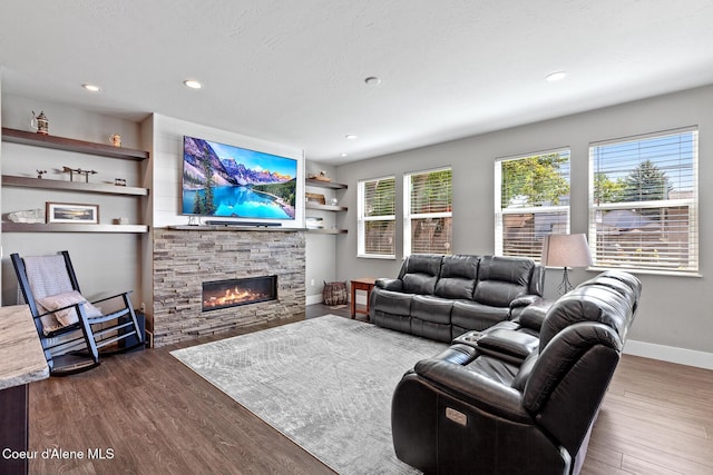 838 N Government Way, Coeur Dalene, ID 83814 - living room with a fireplace, dark wood finished floors, and recessed lighting