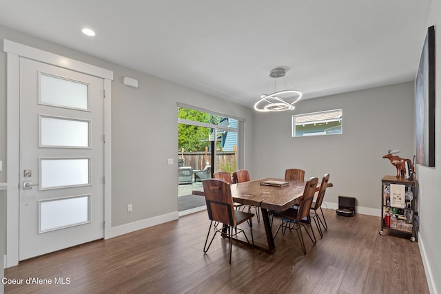838 N Government Way, Coeur Dalene, ID 83814 - dining space featuring dark wood-style flooring, a chandelier, and recessed lighting