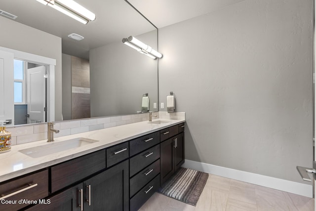 838 N Government Way, Coeur Dalene, ID 83814 - bathroom with double vanity and baseboards
