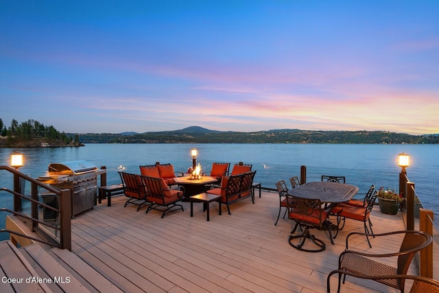 1750 W Valhalla Rd, Coeur Dalene, ID 83814 - dock featuring a fire pit and a water and mountain view