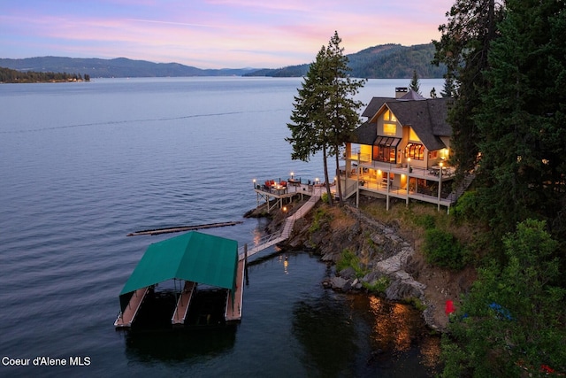 1750 W Valhalla Rd, Coeur Dalene, ID 83814 - water view with a boat dock, boat lift, and mountains
