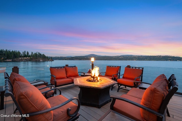 1750 W Valhalla Rd, Coeur Dalene, ID 83814 - wooden terrace with an outdoor living space with a fire pit and a water view