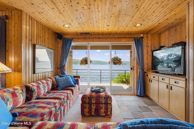 1750 W Valhalla Rd, Coeur Dalene, ID 83814 - living area featuring wood ceiling, wood walls, recessed lighting, and stone finish flooring