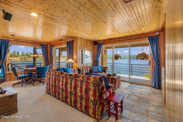 1750 W Valhalla Rd, Coeur Dalene, ID 83814 - living area featuring wooden ceiling, wood walls, and a water view