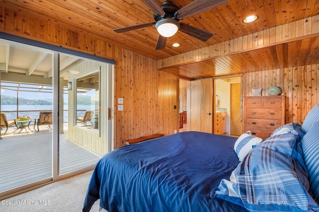 1750 W Valhalla Rd, Coeur Dalene, ID 83814 - bedroom featuring access to outside, wooden ceiling, wooden walls, a water view, and carpet floors