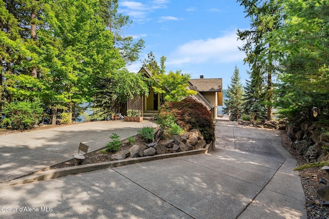 1750 W Valhalla Rd, Coeur Dalene, ID 83814 - view of property hidden behind natural elements