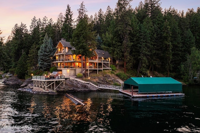1750 W Valhalla Rd, Coeur Dalene, ID 83814 - dock with a water view, a wooded view, and boat lift