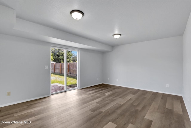 2230 N Methow Ct, Post Falls, ID 83854 - empty room featuring wood finished floors and baseboards