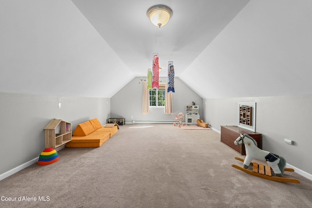 187 White Way, Priest River, ID 83856 - rec room with a baseboard radiator, lofted ceiling, and carpet floors