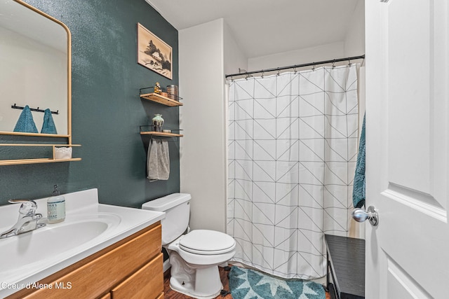 187 White Way, Priest River, ID 83856 - full bathroom featuring vanity and a shower with shower curtain