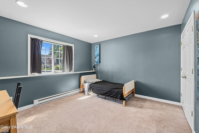 187 White Way, Priest River, ID 83856 - carpeted bedroom with baseboard heating and recessed lighting