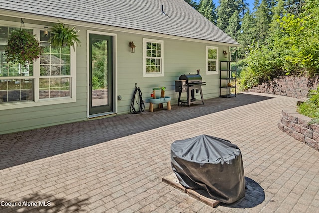 187 White Way, Priest River, ID 83856 - view of patio / terrace with grilling area and an outdoor fire pit