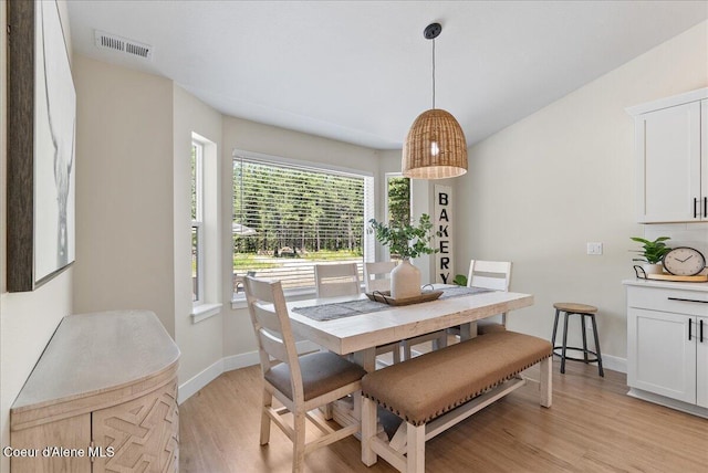 388 Wyatt Ln, Spirit Lake, ID 83869 - dining space with light wood-style flooring and baseboards