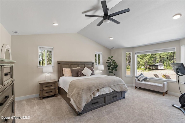 388 Wyatt Ln, Spirit Lake, ID 83869 - bedroom with multiple windows, light colored carpet, vaulted ceiling, a ceiling fan, and recessed lighting