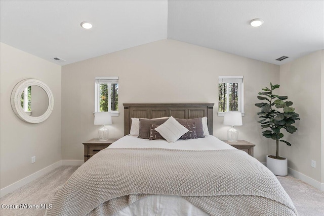 388 Wyatt Ln, Spirit Lake, ID 83869 - bedroom featuring light colored carpet and lofted ceiling