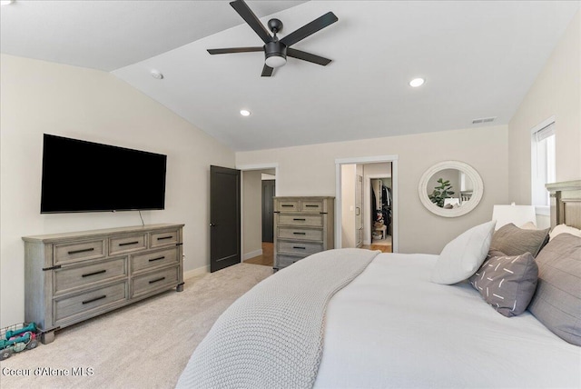 388 Wyatt Ln, Spirit Lake, ID 83869 - bedroom featuring lofted ceiling, a walk in closet, light carpet, recessed lighting, and a ceiling fan