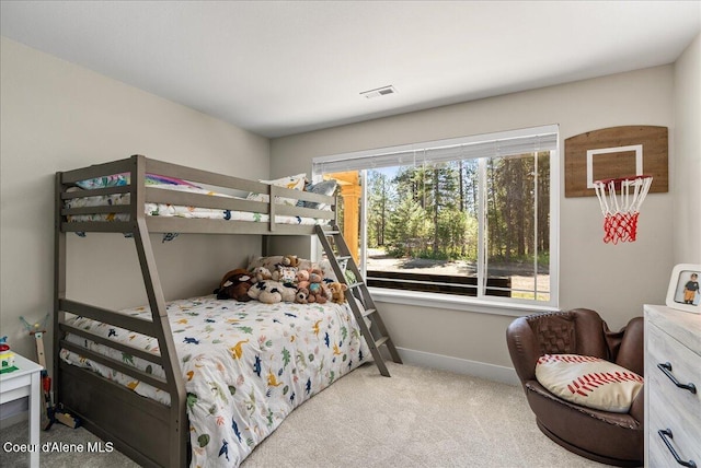 388 Wyatt Ln, Spirit Lake, ID 83869 - carpeted bedroom featuring baseboards